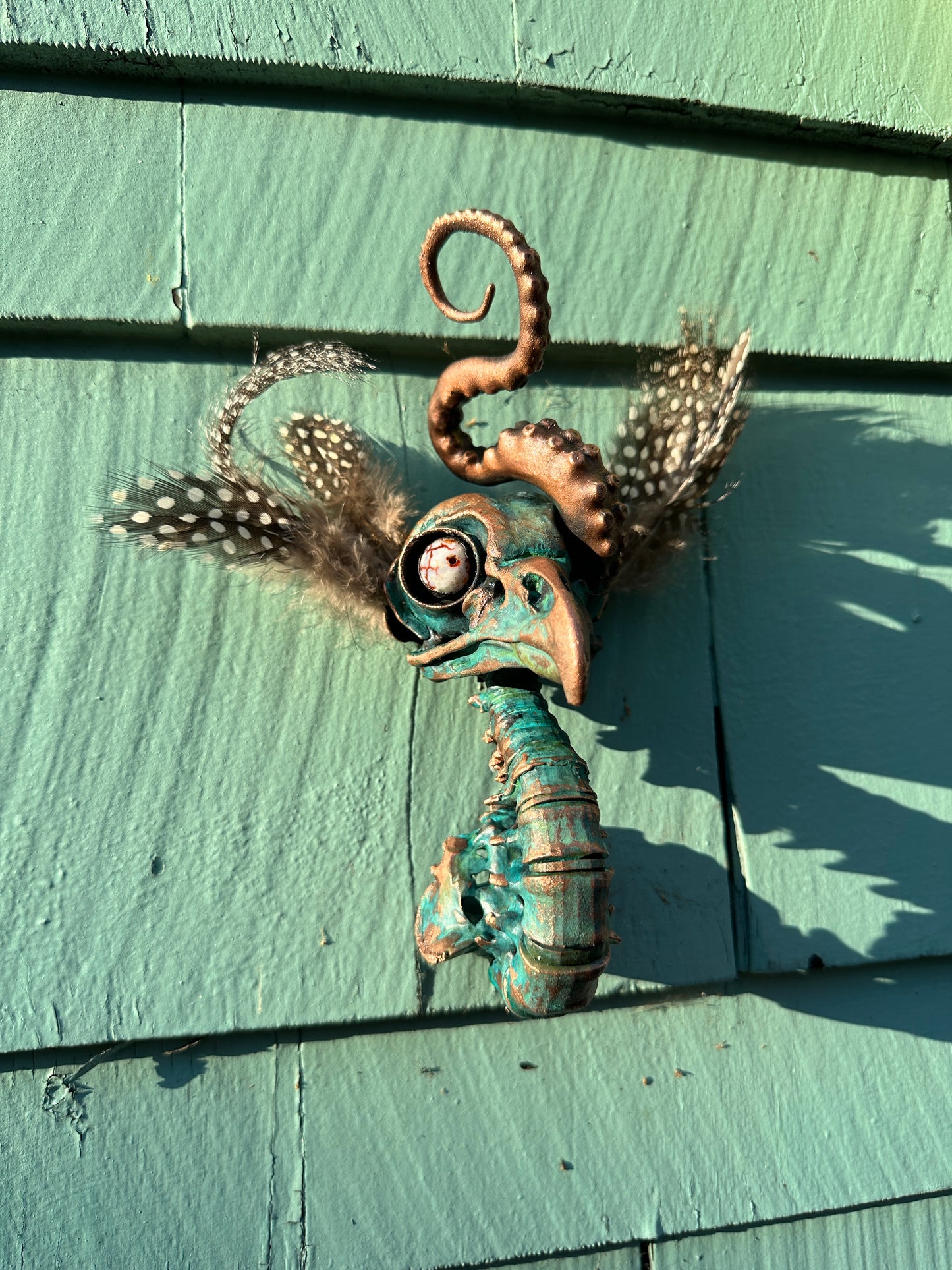 Featherhead w/ Tentacle Wall Mount